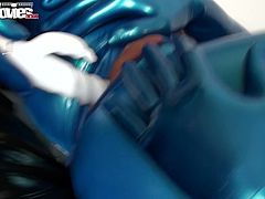 Check out two weird lesbians in tight blue latex suits rubbing each other's clits and poking each other's shaved cunts with one big rabbit dildo.
