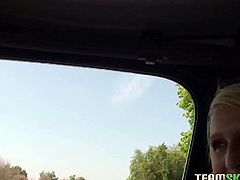 Slutty blonde hoe lets the guy play with her pussy while riding in a car. She just met this guy few minute ago. Skanky chick bends over and starts sucking his dick right in a car.