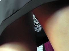Hot babe's fine ass is being spied by dirty voyeur during upskirt scene