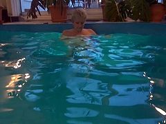 An old granny masturbating in the swimming pool