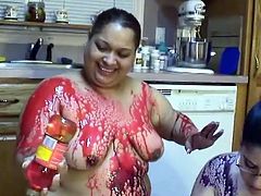 Fat ass bitches are playing nasty games in the kitchen. They get messy in sticky syrup and oily soy sauce. Enjoy watching messy scene featuring two curvy lesbian hookers.