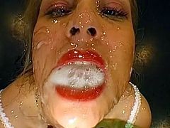 Hottie starts to swallow after having her face covered in jizz during bukkake porn