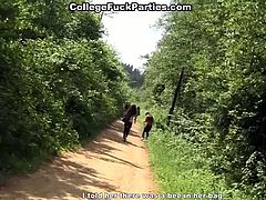 A bunch of college students are chilling at the picnic at the country place. Two dirty sluts give double blowjob by the riverside. Later on they have passionate lesbian sex involving big sex toy.