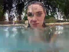 Charley Chase is a kinky underwater Hottie in this amazing free porn video. See her showing her big round tits while taking a dip in the pool for your enjoyment.