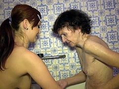 Skinny lesbian granny takes shower with her hot young girlfriend