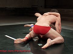 Check out these horny studs involved into some hard wrestling. Watch them giving their best to humiliate each other and finger their buttholes!
