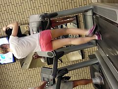 Hot blond girl on threadmill running with thong