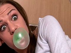 Nasty brown-haired girl Addison is lying on a bed in her room in front of a webcam. She chews a bubble gum and plays with it seductively.