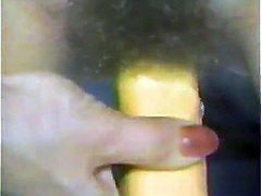 Stunning retro chick with perky boobs toys her hairy vagina. After some time she starts to shove sex toys in her ass in close-up video.
