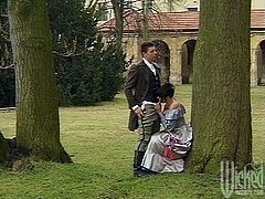 All the people in this video are dressed in XVIII century clothes. Some brunette lady falls in love with some gentleman. She gives him a blowjob in a garden and then gets ass fucked in a barn. The man also cums on her pretty face.