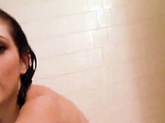 Busty Carlotta Champagne shows off her nude forms in alluring solo shower scene