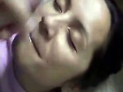 Lusty brunette girl serves her face for a fat facial cumshot. Horny dude strokes the rod before her face. When he explodes big cumshot he glazes her cute face with big portion of jizz.