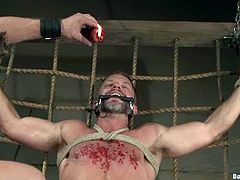 Jeremy Stevens gets whipped and then tied up by Dirk Caber. Later on Jeremy gets his body poured with hot wax. Later on he also gets fucked in his mouth and ass.