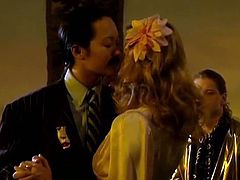 Man looking Asian sultry babe dances with eye catching blond head wench.Brutal guy look at them passionately. One of these hotties removes her dress and demonstrates her divine honey sweet boobs... Watch this awesome chicks in The Classic Porn sex clip!