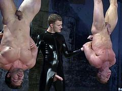 Van Darkholme and Derek Pain get tied up and tortured by two dudes in latex bodysuits. Then two hunks sucks dicks and get their asses torn up.