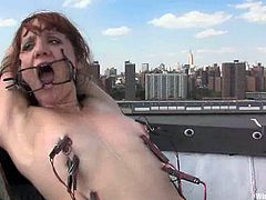Betty Baphomet enjoys having a lot of wires on her pussy lips