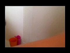 Girl films her little sister in the shower