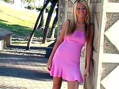 Have fun watching this blonde siren, with giant jugs wearing a pink dress, while she shows her breasts and her pussy in a solo model video.