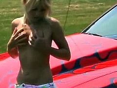 VideosZ brings you a nasty free porn video where you can see a wild blonde belle as she masturbates and sucks a hard cock outdoors, on the hood of a red car.