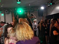 Party in the local club turns into hardcore public fucking action with horny sluts.