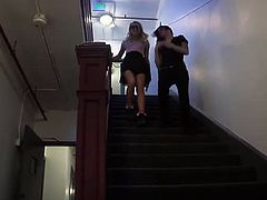 Carmen Callaway and Nikki Hearts meet on the street and start flirting. Carmen is a slim blonde, while Nikki is a brunette with tattoos. They flirt and go indoors.