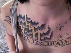 Delightful raven haired bitch with pretty face and and cool tattoos all over her body gets her round boobies fondled. Hussy gets on her knees and starts sucking two big dicks.