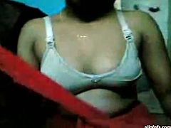 Gross and nasty Indian hooker is absolutely submissive to horny desi. He exposes her tits and squeezes them hard while making an amateur sex video.