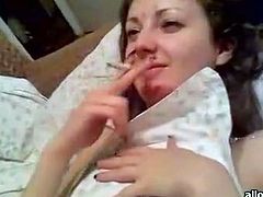Luscious brunette girl smokes a cigarette in bed after having steamy fuck fest. Then she sucks engorged hard dick of her BF giving deepthroat blowjob.