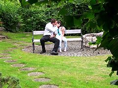 Filthy whore with dark hair gives a great blowjob sitting on the garden bench to the naked guy. Watch in Mofos Network sex clip.