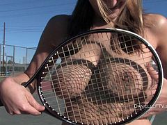 Naughty Danielle takes off her top and plays tennis with her amazing tits bouncing around then she pulls her shorts to the side and fingers.
