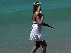 Captivating blonde Alison Angel is having a great time at a beach. She bathes and has fun and then takes her bikini off and demonstrates her hot body.