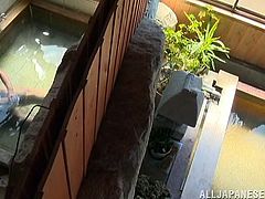 This Japanese milf washes her man gently and then goes on tugging his cock while they're getting ready for the jacuzzi to really get hot. She sucks him a bit too and then they make love in the bubbling hot spring water. These Nippon honeys know how to treat their men.