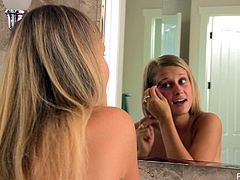 We get a fantastic view of her amazing, giant rack as this hot blonde stands naked in the bathroom and gets ready for her day.