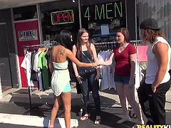 These girls were out shopping, when a crew of a sex show stop them. See, if they wan't to take part on some kinky and funny actions! A group of men line up against the wall and drop their drawers. The girls play with their cocks, using sticks.