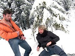 Skiing is something special for this gay couple. They find this off track place quite safe to unzip pants and stick each other's cocks in holes.