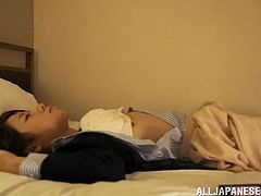 Take a look at this amateur video where this horny Asian babe is fucked by this guy as she's asleep on her bed.