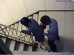 Amateur japanese couple is caught on a security camera in the stairs of a building. She gets on her knees, gives head and then bends over and they fuck doggy style