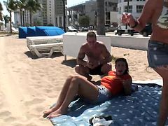 A slutty blonde chick chills on a beach. He meets some guy there. They go to a motel after a short conversation. Roxy gives head to the guy and then gets titty fucked. Of course then she also takes pussy pounding.