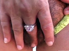 Curvaceous mom with big boobs and ample round booty poses for camera wearing tiny thongs. She exposes her bearded clam outdoor. Kinky bitch brushes her natural hairy pussy.
