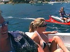 This slutty ass bitch sucks dick and gets her pussy stuffed big time by some dude aboard a fuckin' boat, check it out right here!