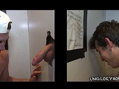 A horny fucker sucks on a hard cock through a gloryhole, check it out right here, it's fuckin' hot as fuck. Hit play and enjoy!