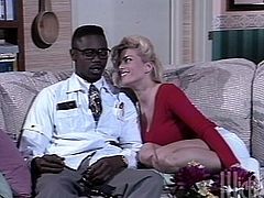 Take a look at this interracial sex scene in this vintage video where the slutty blonde Britt Morgan sucks and fucks a big black cock until her mouth's filled by semen.