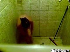 Dark haired horny bitch with nice body shows her ass taking the shower. Have a look at this slut in The Indian Porn sex clip.
