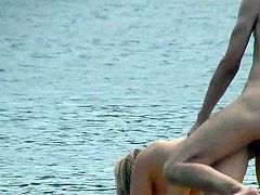 Horny couple caught on cam while enjoying rough sex at the beach with voyeur watching them in secret