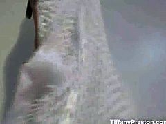 Tiffany Preston brings you a hell of a free porn video where you can see how this horny brunette poses and teases in white fishnets while getting ready for something much hotter.