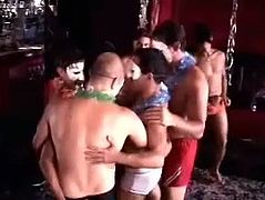 A group of poofters are having a Hawaii party indoors. The fairies show their cock-sucking skills to each other and then pound each other's butts in cowboy and other positions.