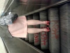 Quick upskirt on escalator 2