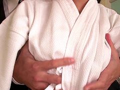 The Japanese do things a bit differently in the bedroom, and this couple shows us all. They're dressed up to get it on, and the guy gropes his woman all over, even getting her tits out to be squeezed. She's on her knees afterwards, sucking her man's cock.