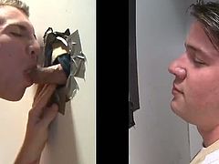 This horny guy went to a gloryhole, stuck his cock through the hole in the wall and got the best head ever from another guy.