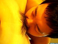 Horny Asian stud shoots and licks hairy pussy of his whorish wifey